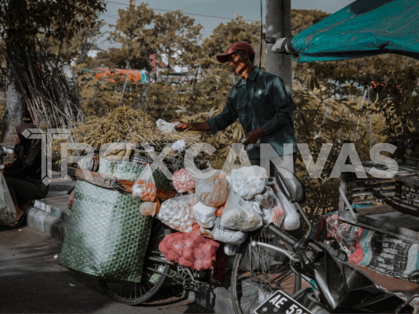 someone selling vegetables on the street