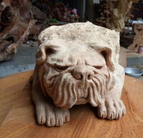 Carved dog statue